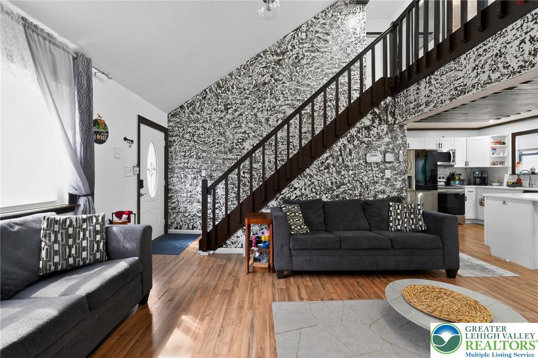 Image 3: This inviting space features an open concept floor