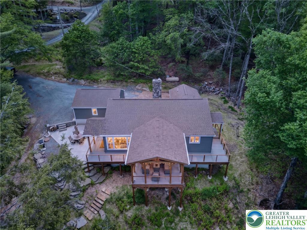 Image 3: Hillside retreat with expansive decking and charmi