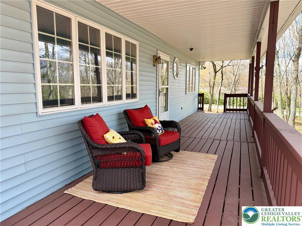Image 3: Over 600 sq ft covered & open front deck