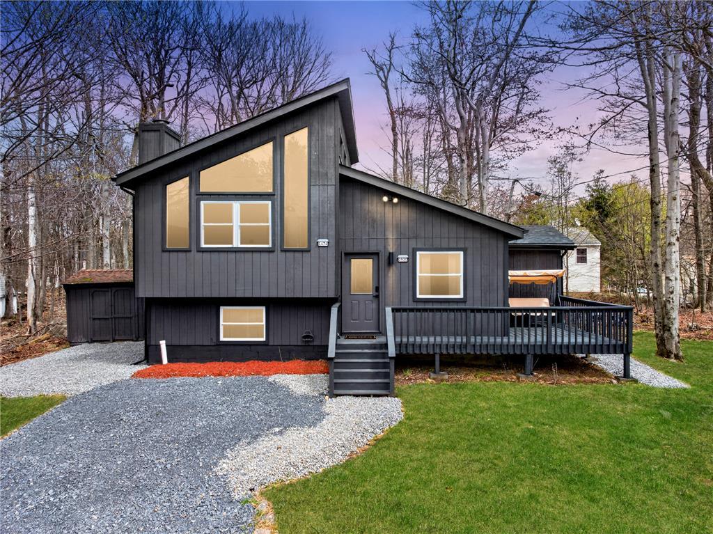 Image 1: Bold exterior architecture with angular roof lines
