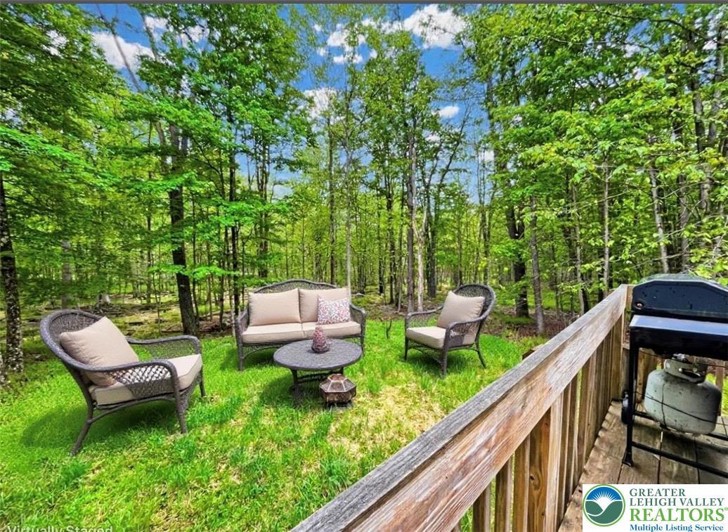 Image 3: A tranquil outdoor living space nestled in a lush