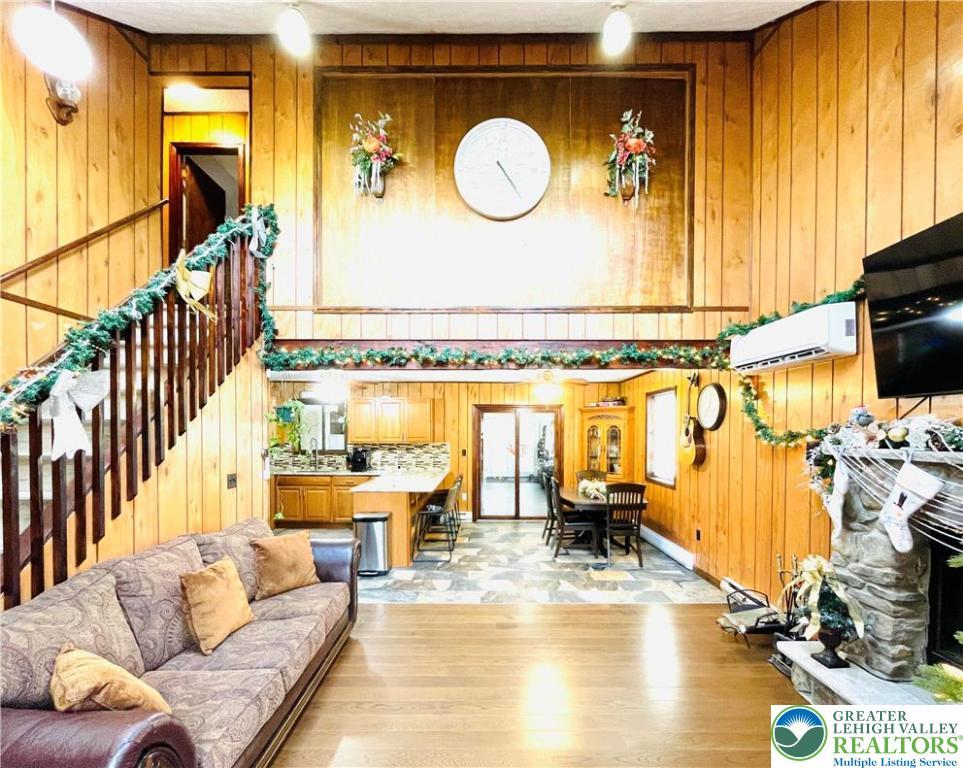 Image 4: The house features wood flooring in every room.