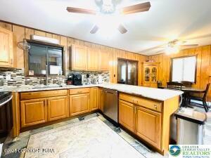 Image 2: Renovated kitchen with granite countertops and kit