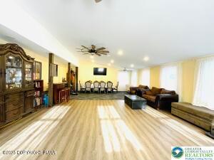 Image 4: Living and entertaining room with backyard access