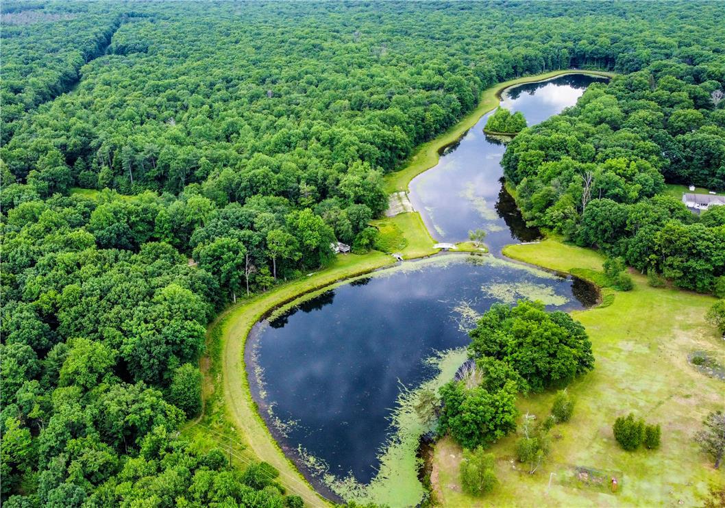 Image 3: An aerial perspective reveals a serene, private la