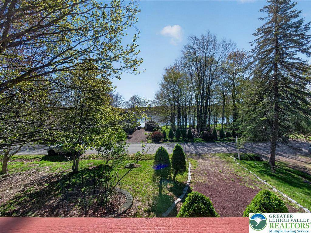 Image 3: This scenic property offers a captivating view of