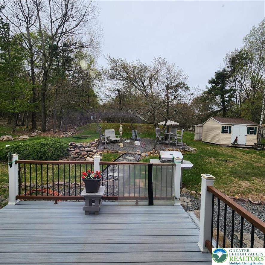 Image 4: This spacious backyard offers a perfect blend of o