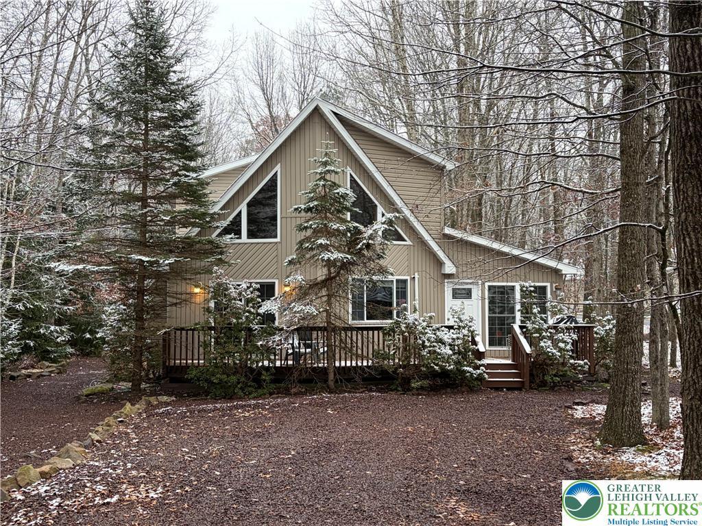 Image 4: An idyllic snow-covered Pocono Mountain retreat.