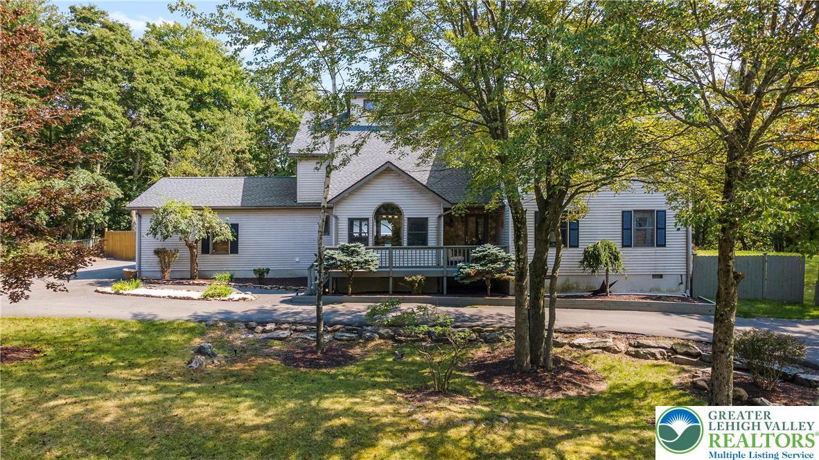 Image 2: Front w/ Abundant Parking