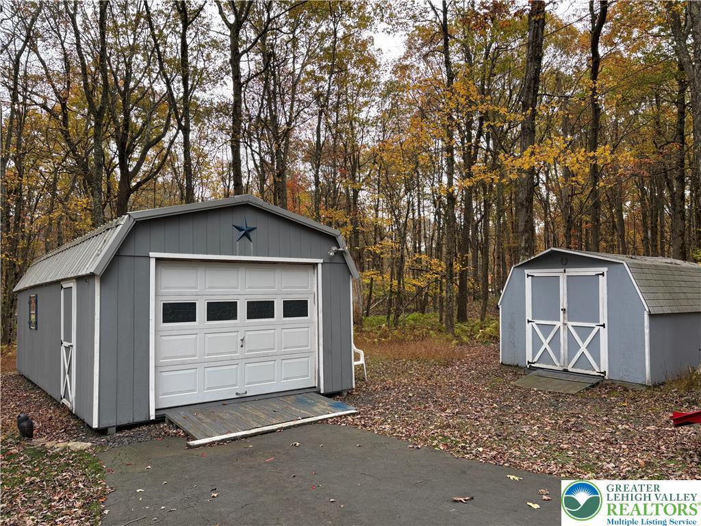 Image 2: garage and shed
