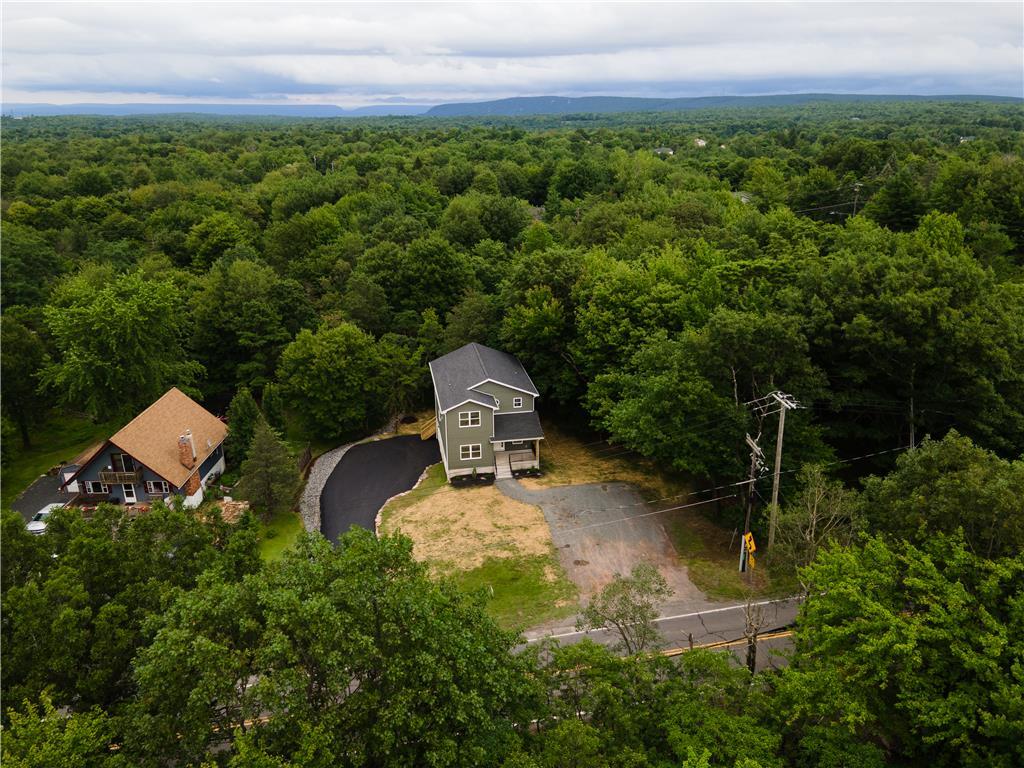 Image 2: An aerial perspective reveals a private residence