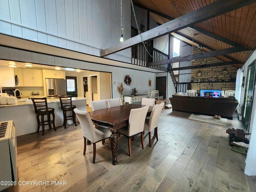 Image 3: This inviting interior features a modern kitchen,