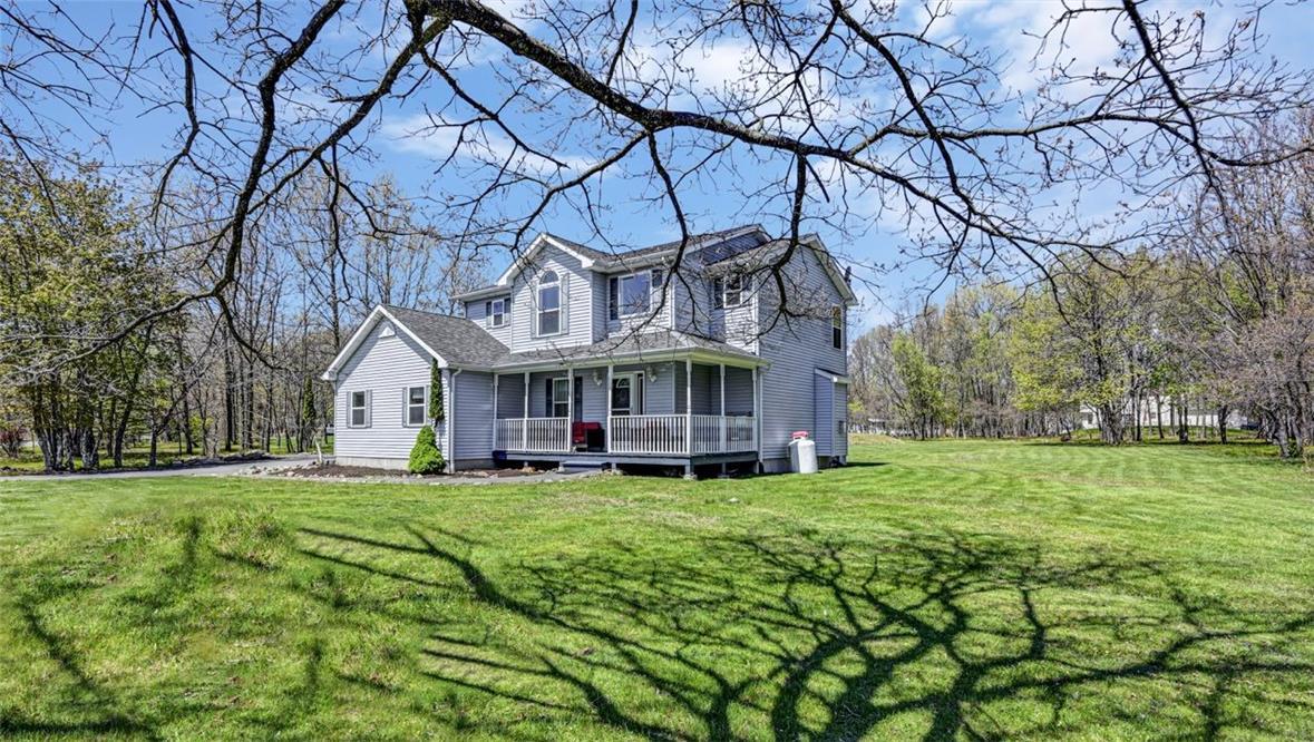 Image 1: Quiet, private setting lined in mature trees and a