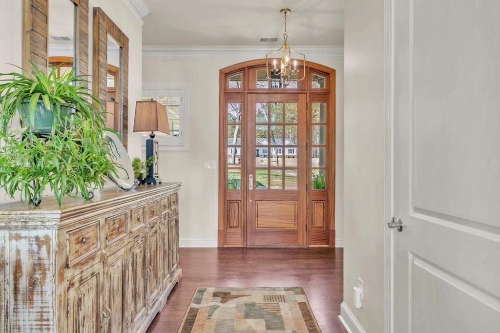 Image 3: Wide Foyer Entrance With Access To Powder Room