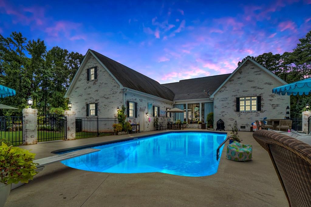 Image 2: Pool Area at Dusk