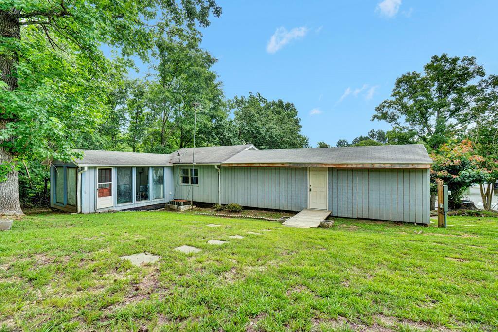 Image 2: SW HAS ADDITION & ENCLOSED PORCH