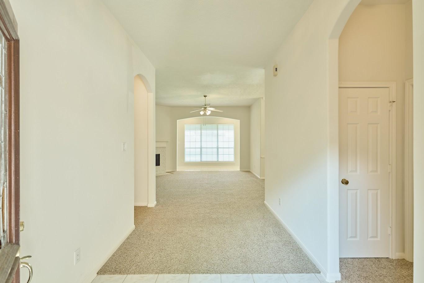 Image 4: Entryway through foyer directly into living area