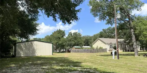 Image 3: Side Yard View from Shop