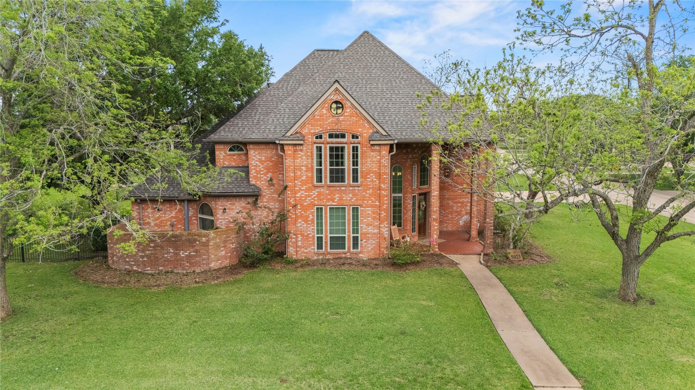 Image 4: Beautiful two-story brick home with a new roof, ma