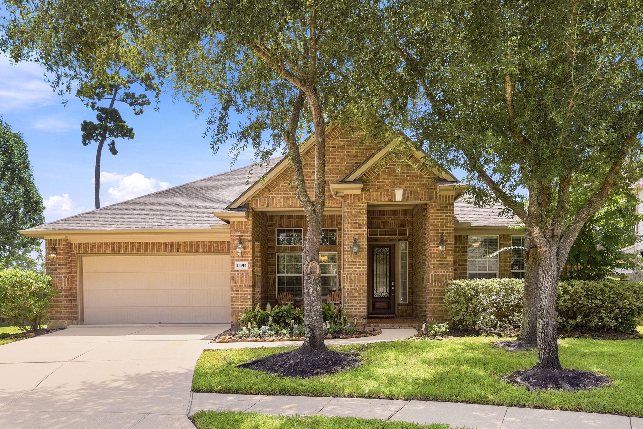 Image 1: Beautiful 4-sided brick home shaded with mature tr