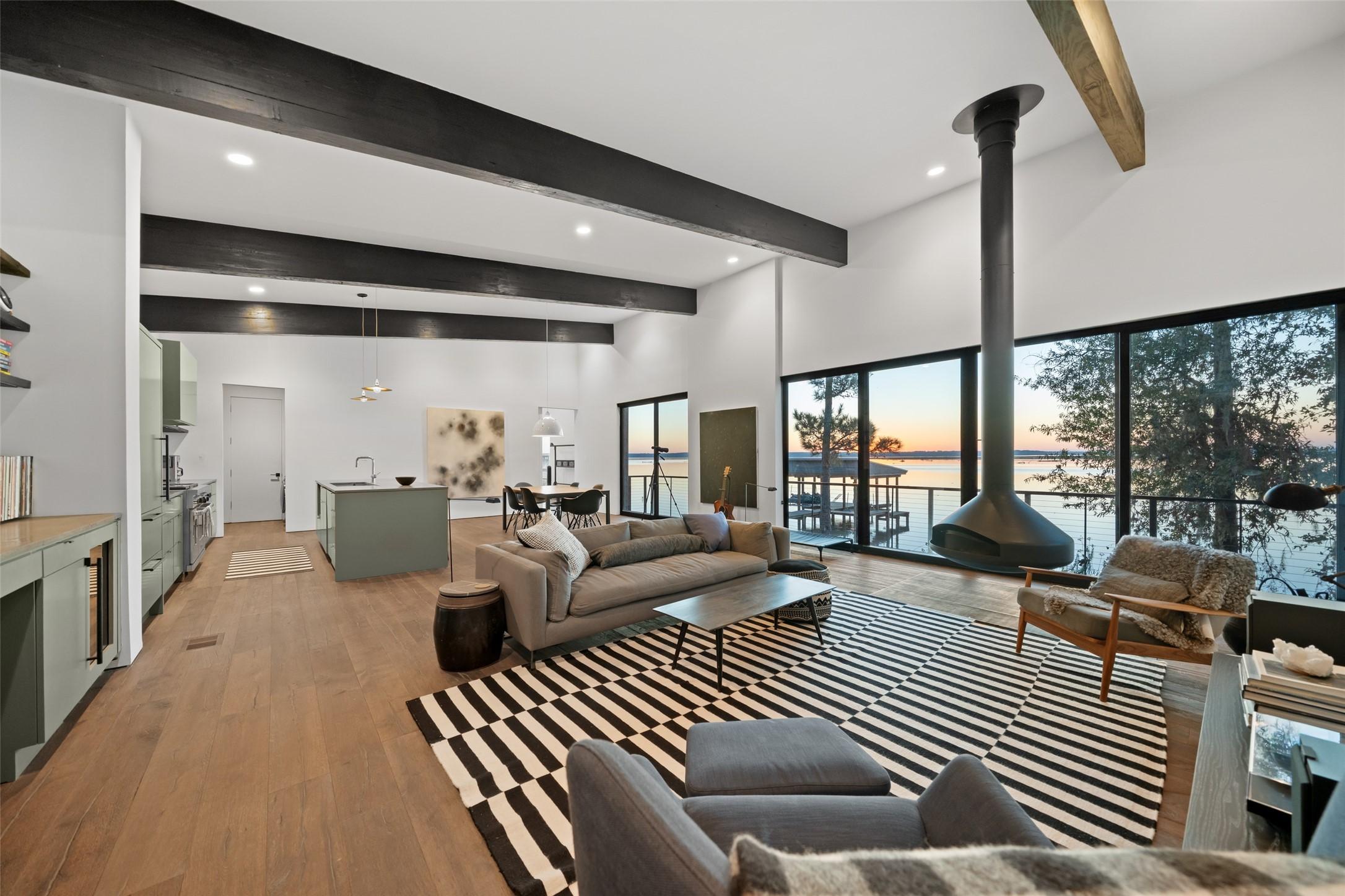 Image 1: The main living space unfolds as a cohesive archit