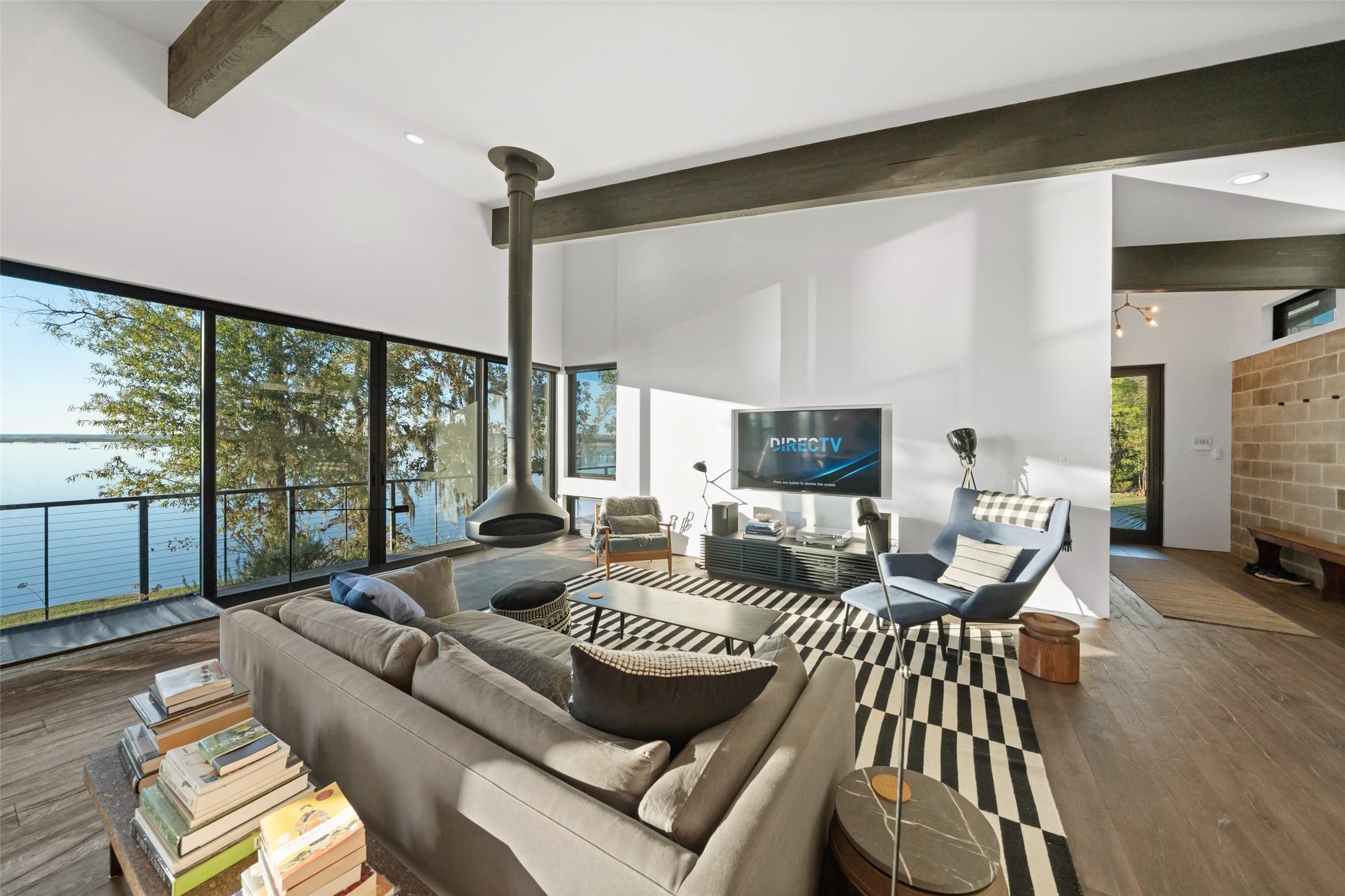 Image 4: The main living room centers around a dramatic sus