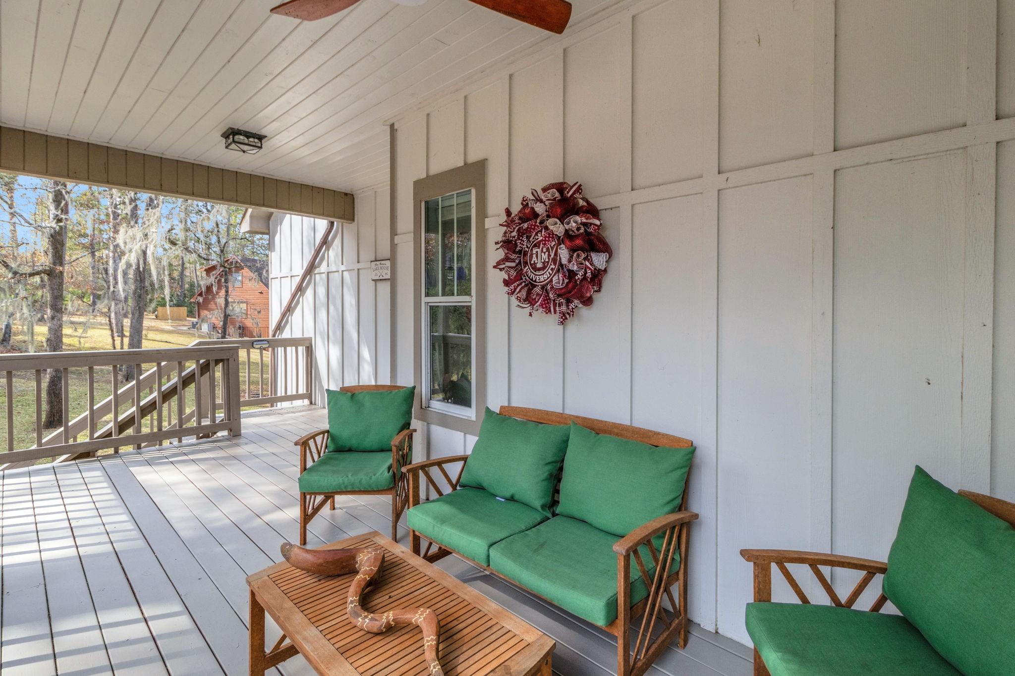 Image 3: Relax on the inviting covered front porch with you