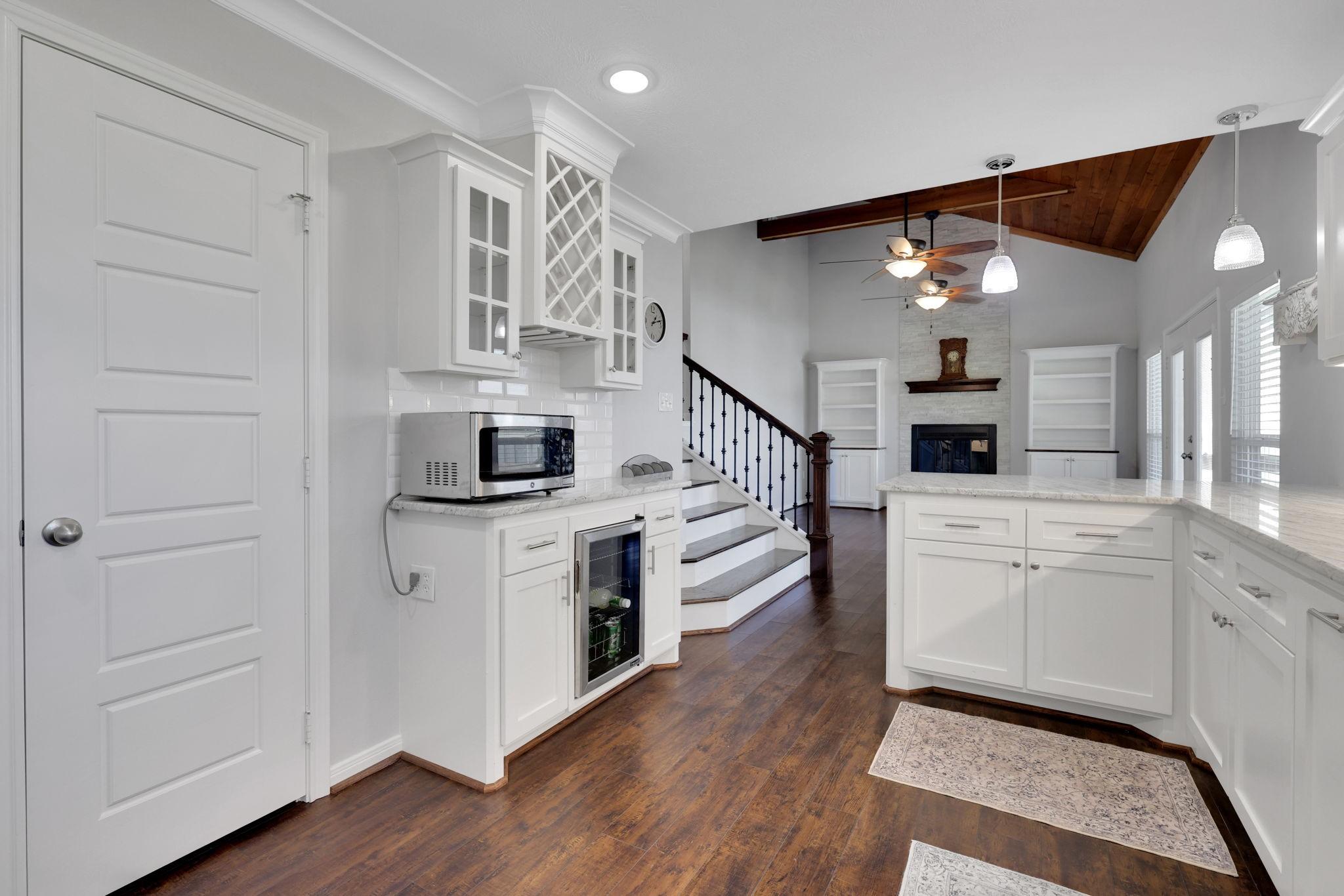 Image 3: Kitchen features a spacious walk in pantry and a d