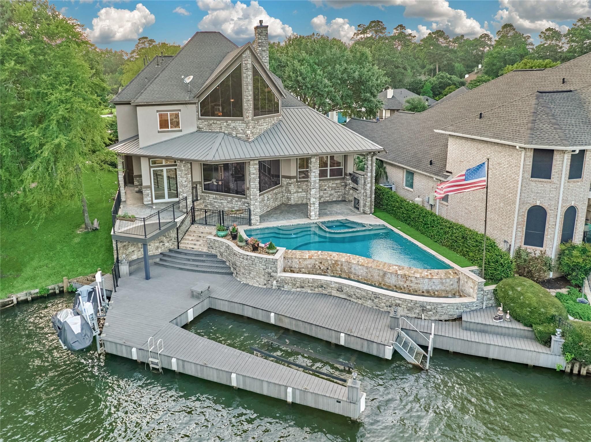 Image 3: This backyard paradise has space for everyone! A c