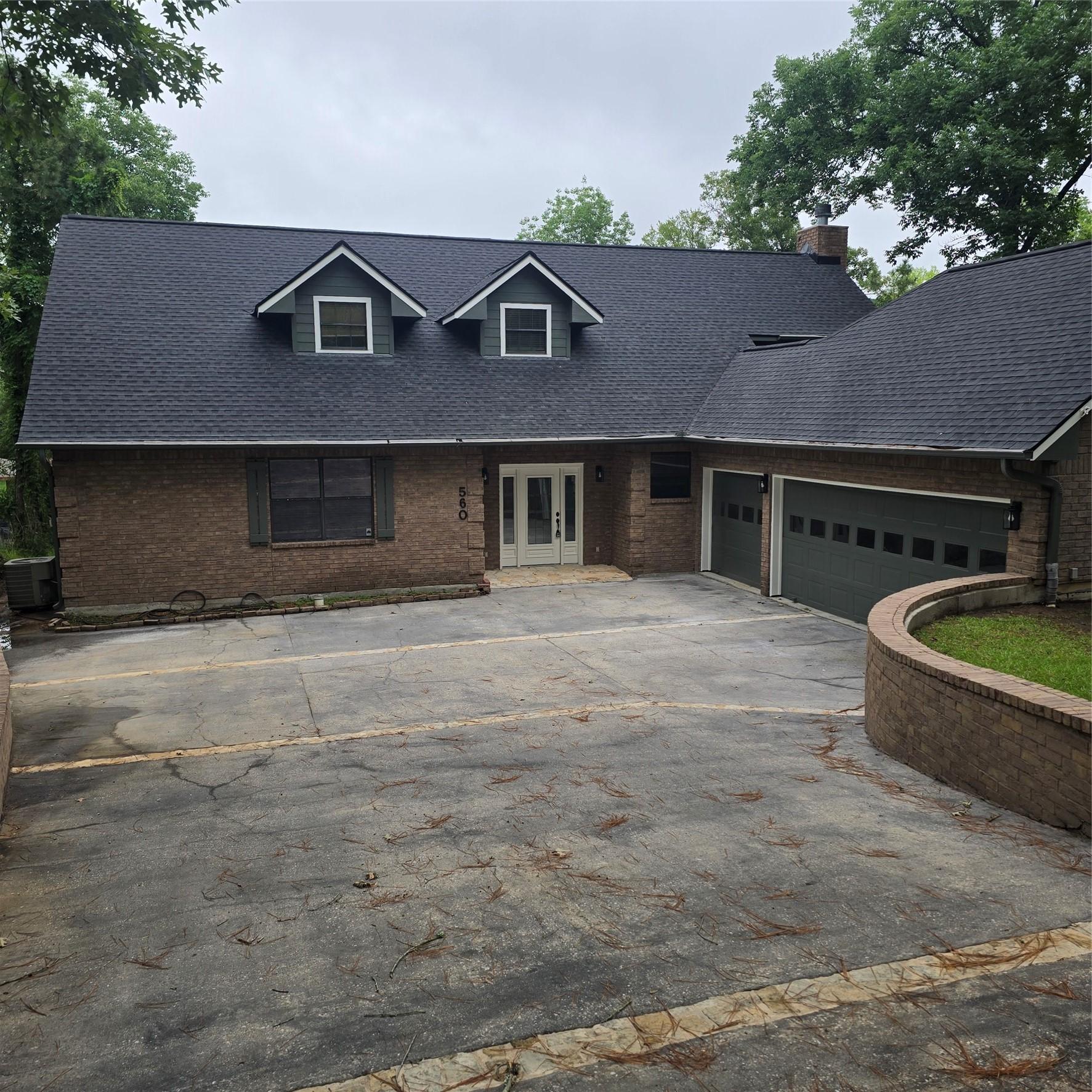 Image 2: FRONT ELEVATION AND 3 CAR GARAGE
