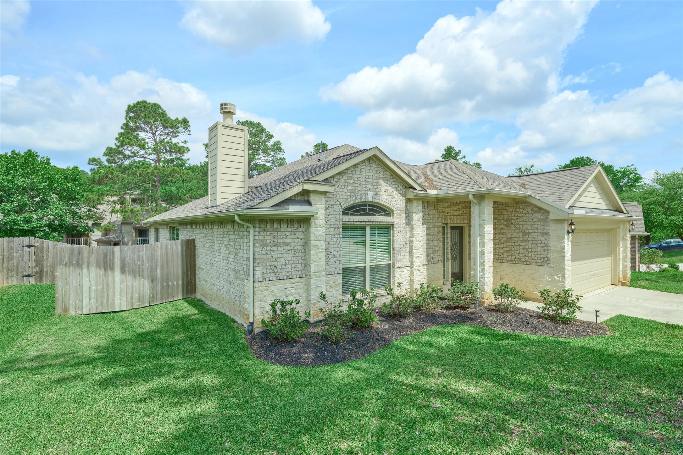 Image 2: All brick home includes sprinkler system & fenced