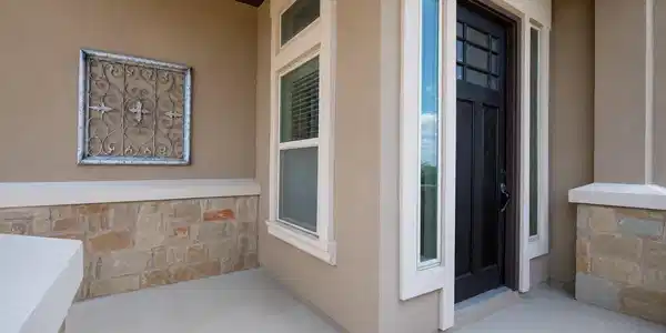 Image 4: Front door with a single home feel