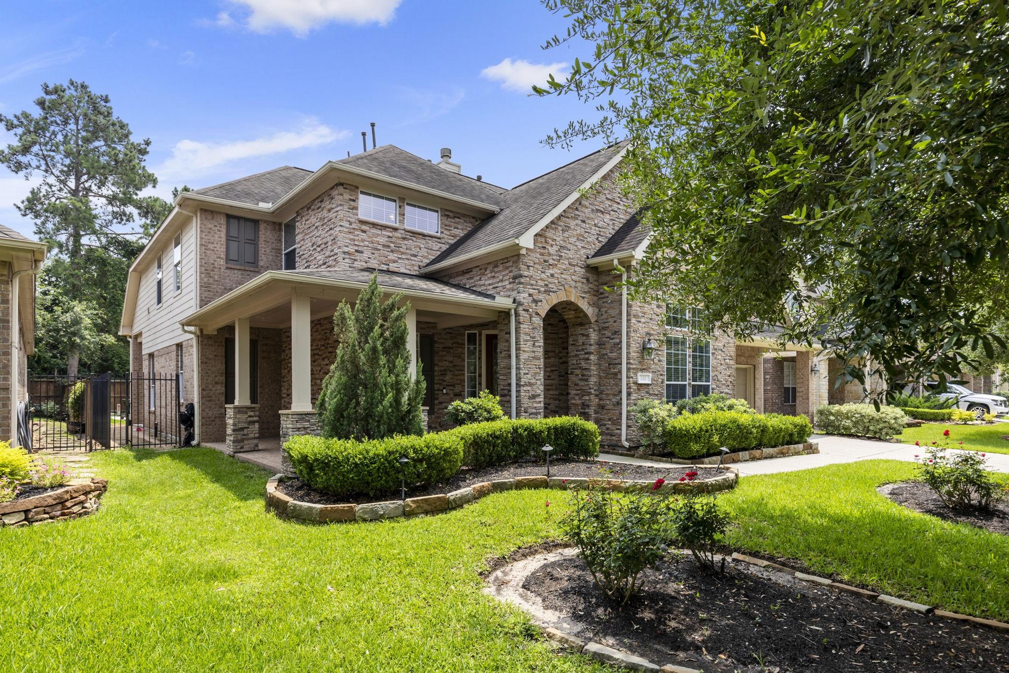 Image 2: Charming two-story brick home with nice elevation