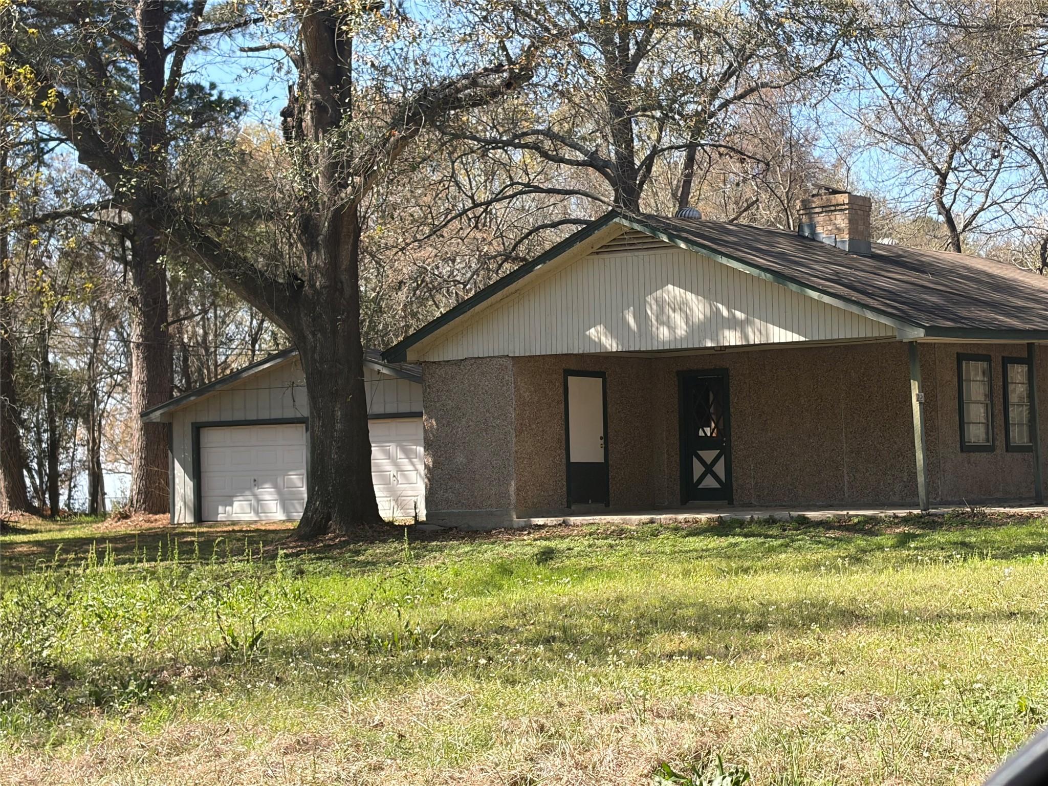 Image 2: Carport and Double Garage