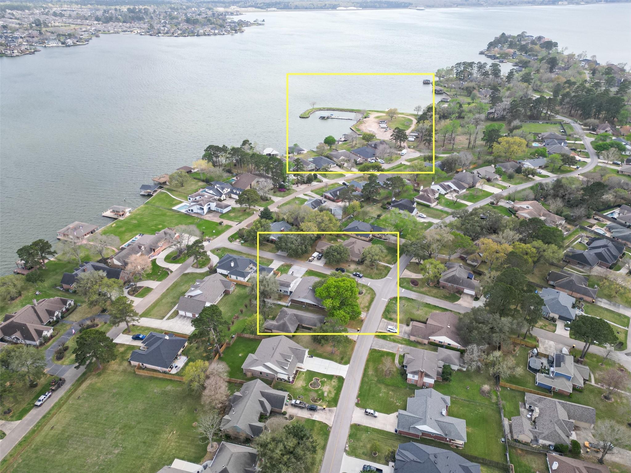 Image 2: Home in relation to the community boat ramp, slips