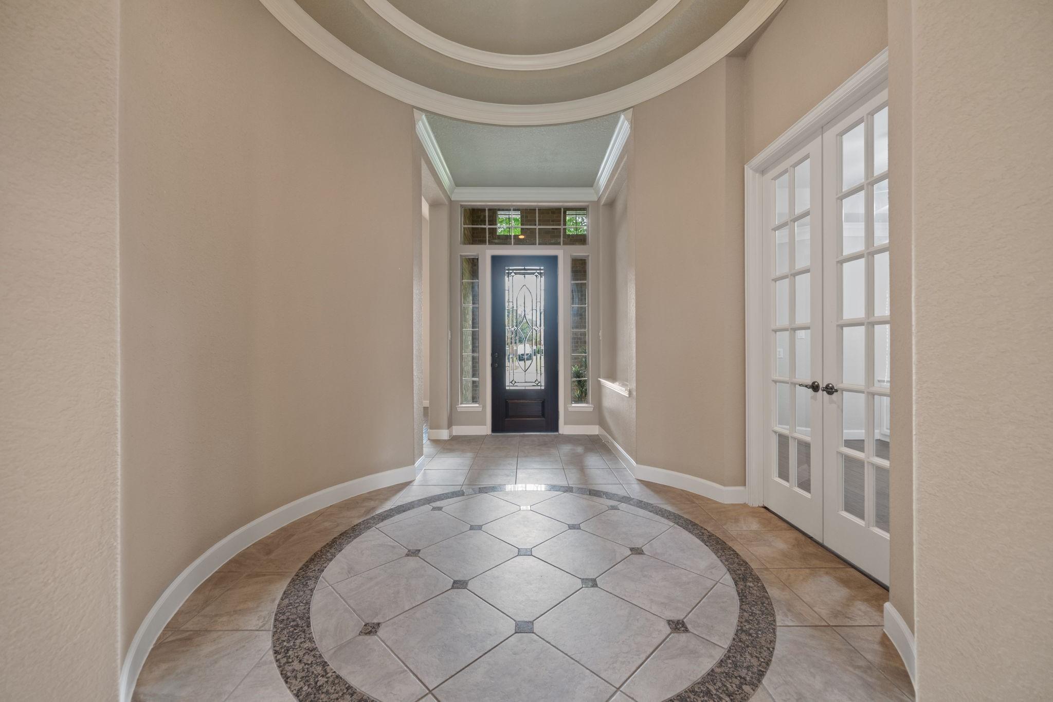 Image 4: High ceilings with architectural detailing, and a