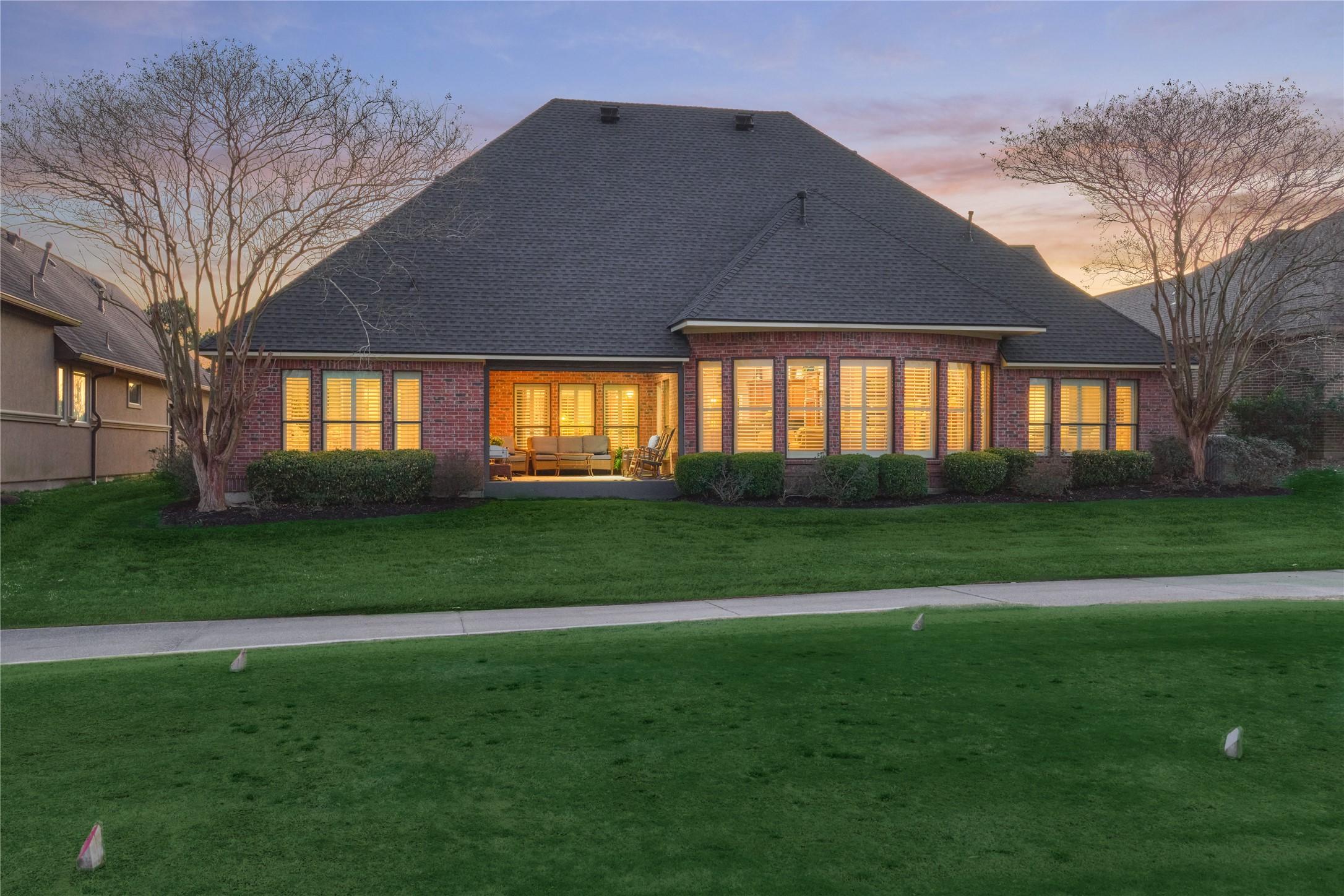 Image 3: A view of the back elevation from the golf course.