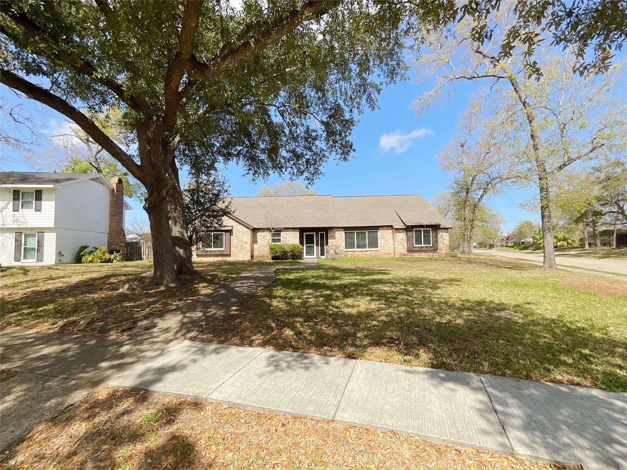 Image 2: Charming single-story brick home on a corner lot w