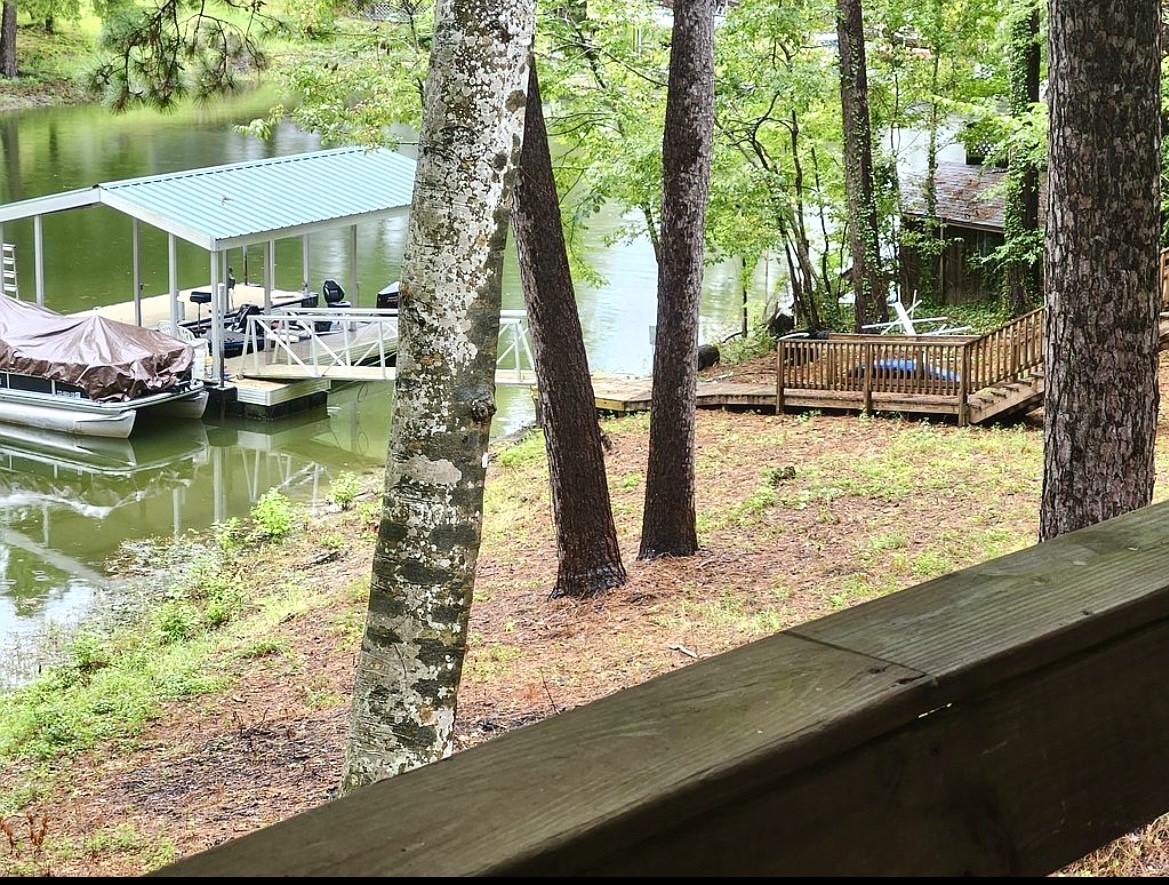 Image 3: Very nice covered boat dock with power and water!