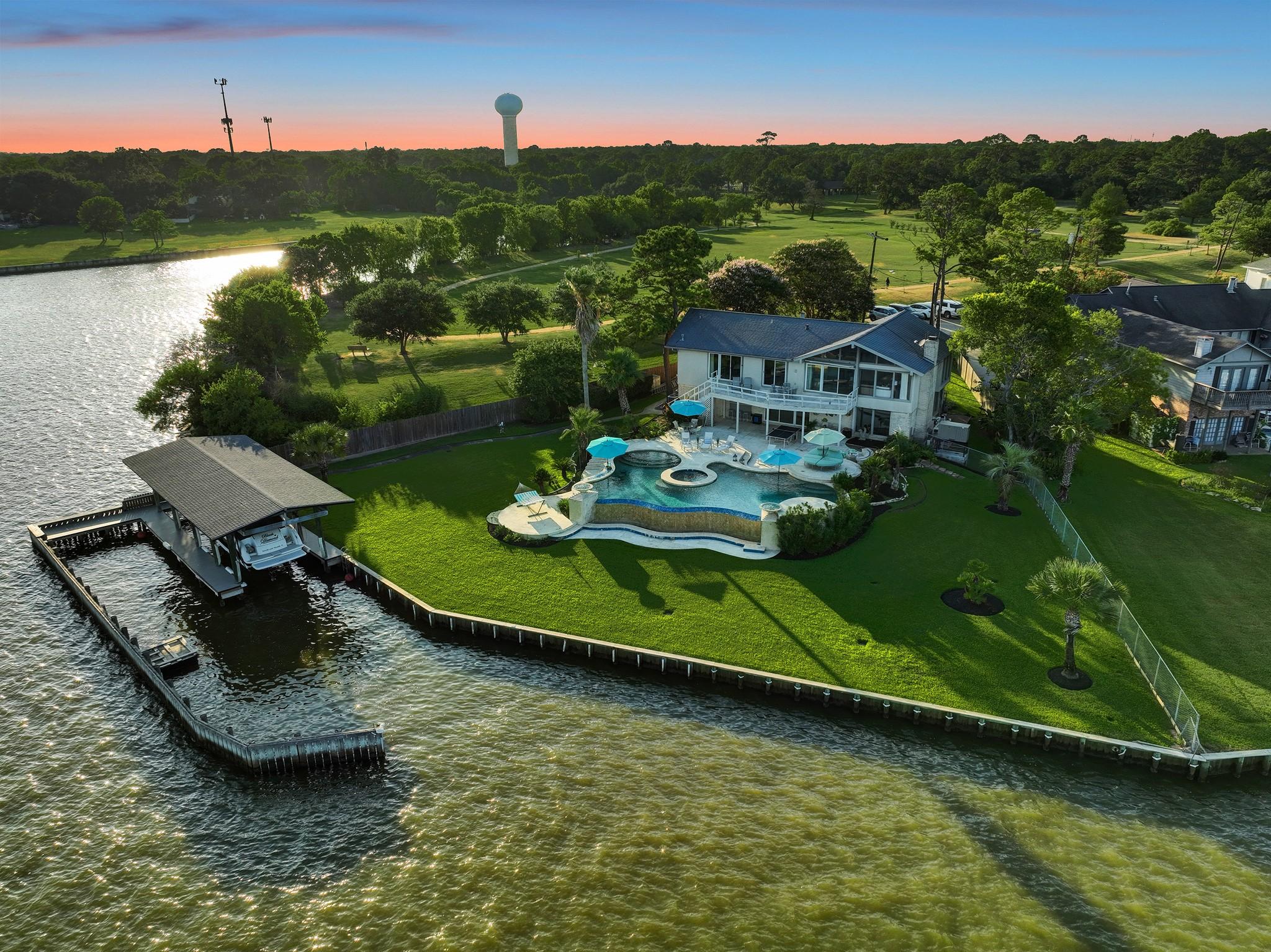 Image 1: Welcome to 602 Shorewood Drive. Situated at the en