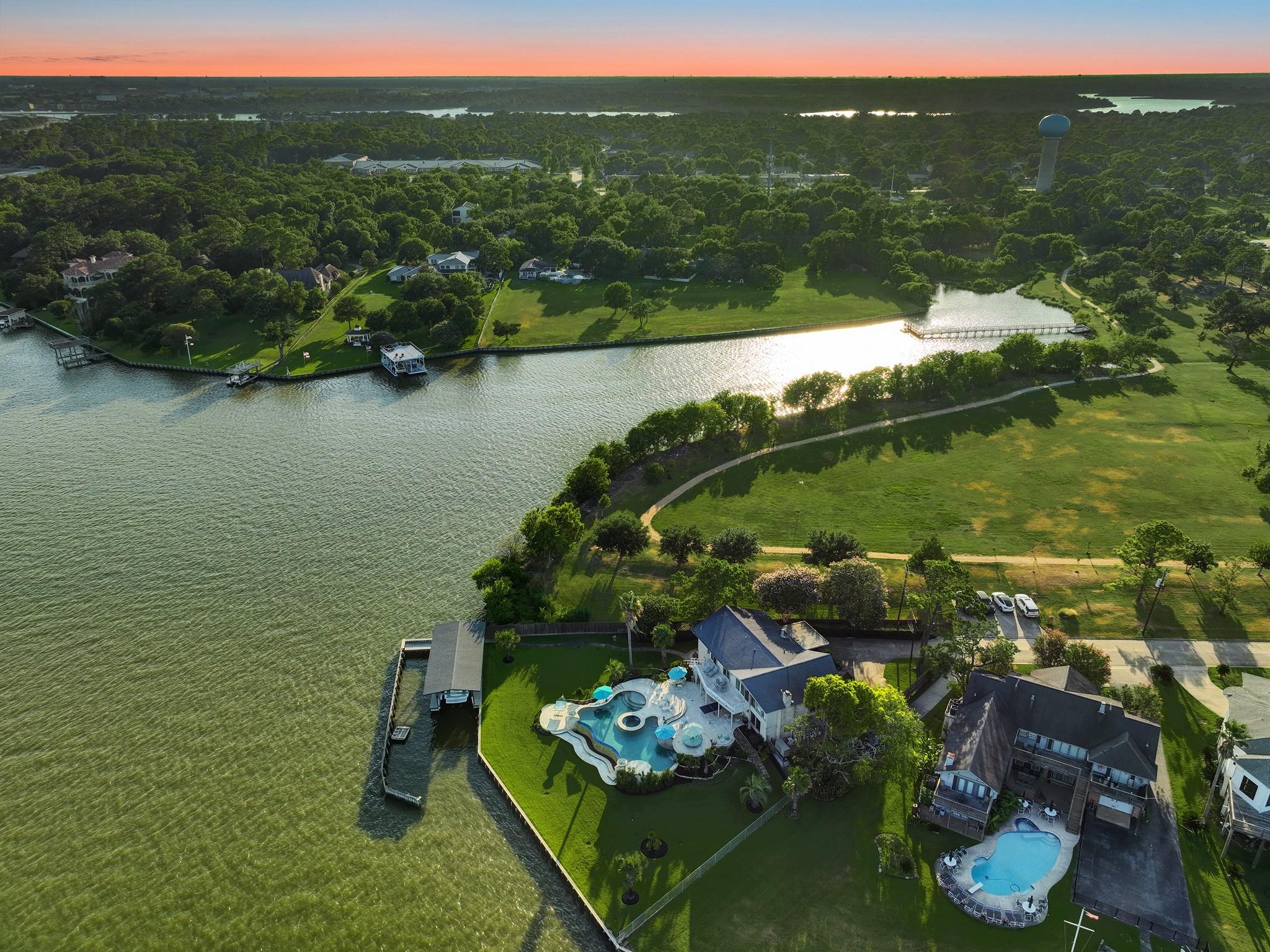 Image 3: Aerial view showing the property and adjacent comm