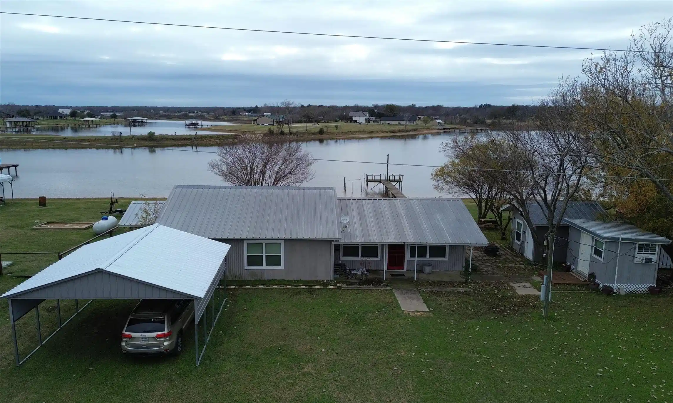Image 1: Aerial View of Home