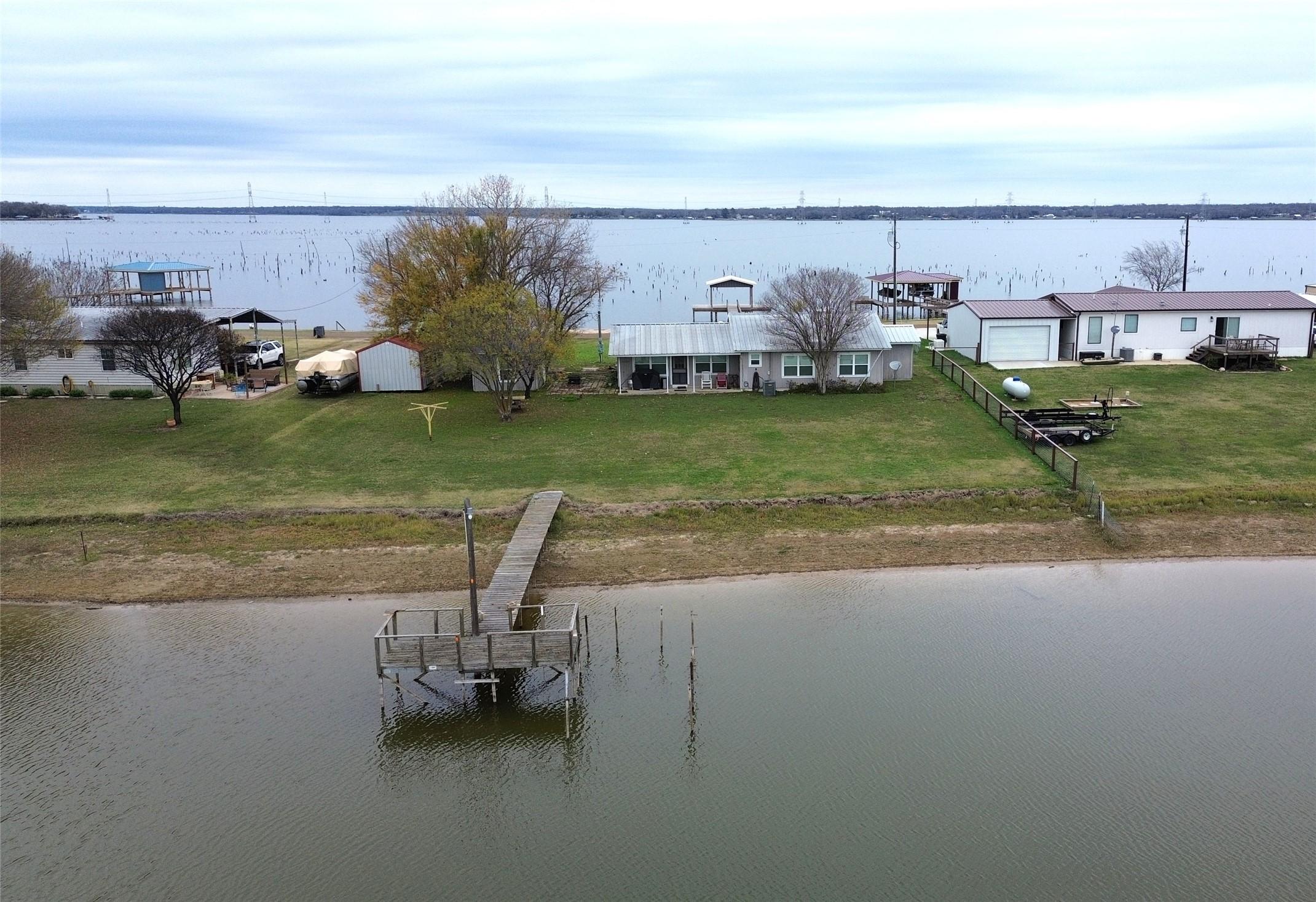 Image 3: View of Property from Cove toward Main Lake