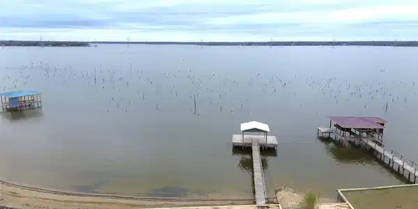 Image 4: Aerial View of Main Lake Side of Property