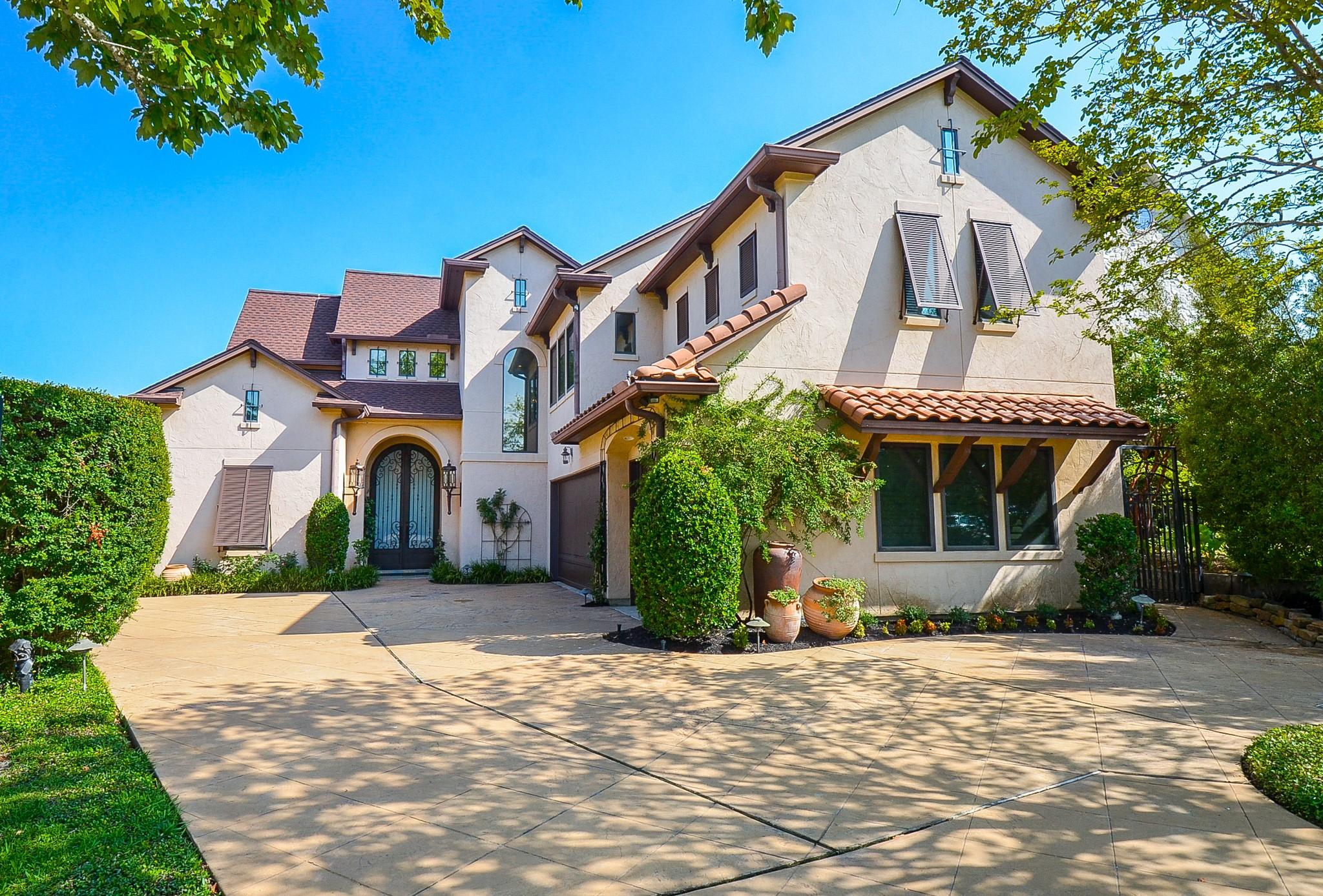 Image 2: While the front of the home maintains an understat