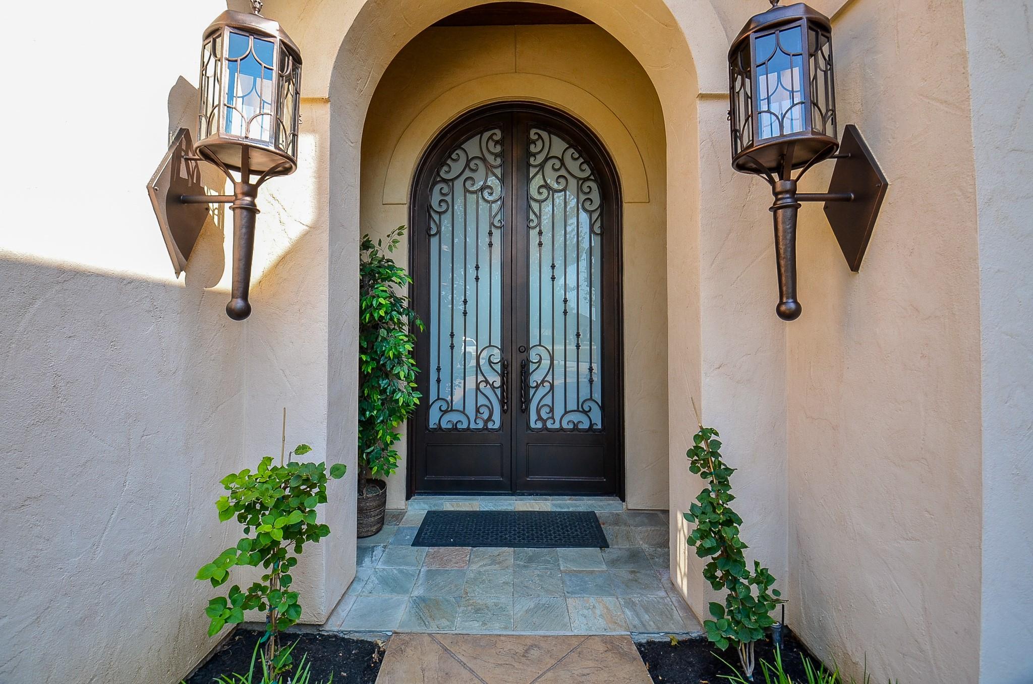 Image 3: The front entry beautifully showcases oversized ar