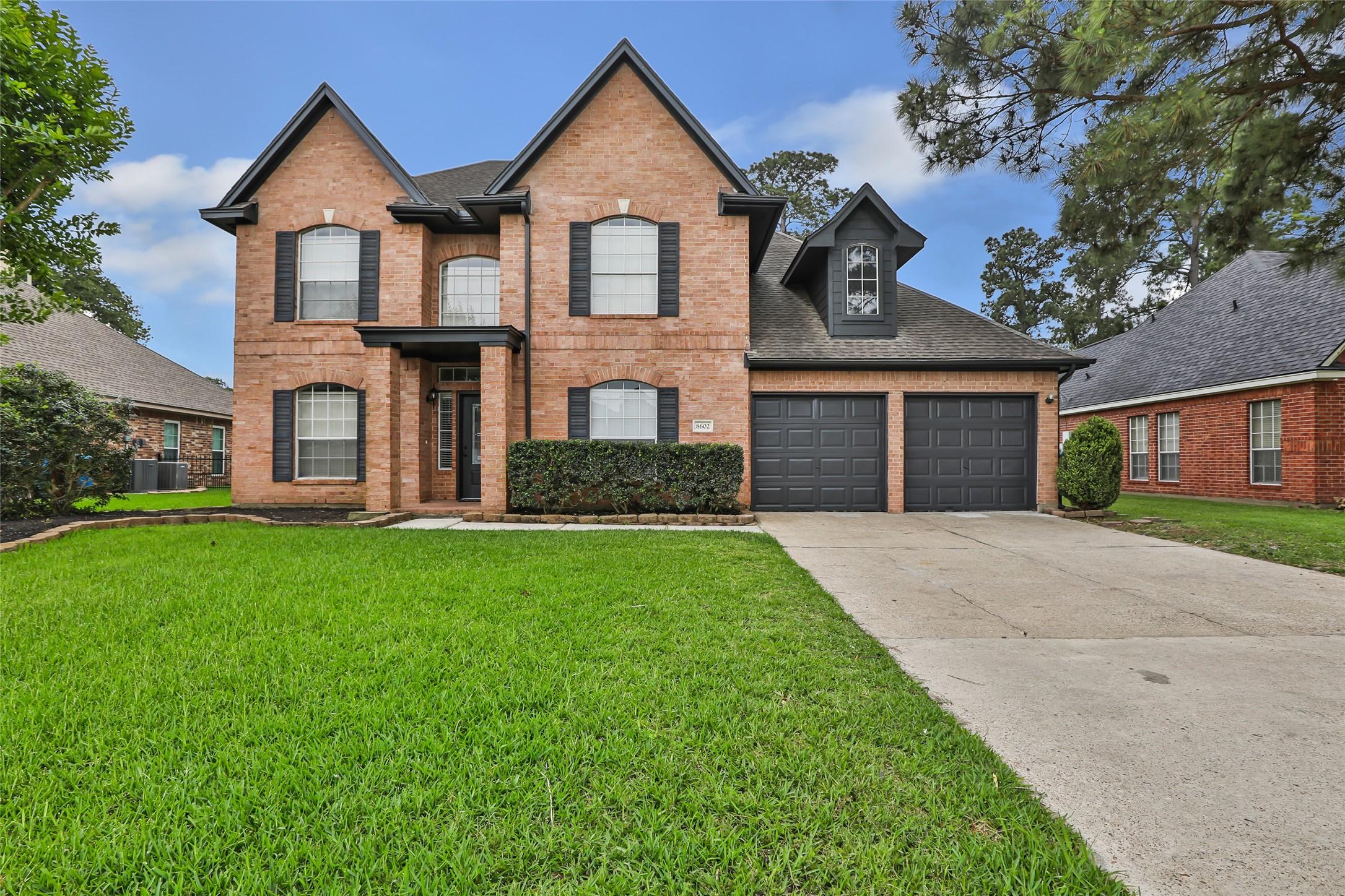 Image 2: Beautiful curb appeal welcomes you home to this sp