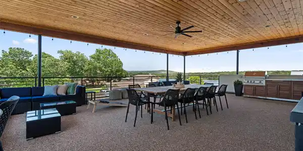 Image 3: This photo showcases a spacious outdoor patio with