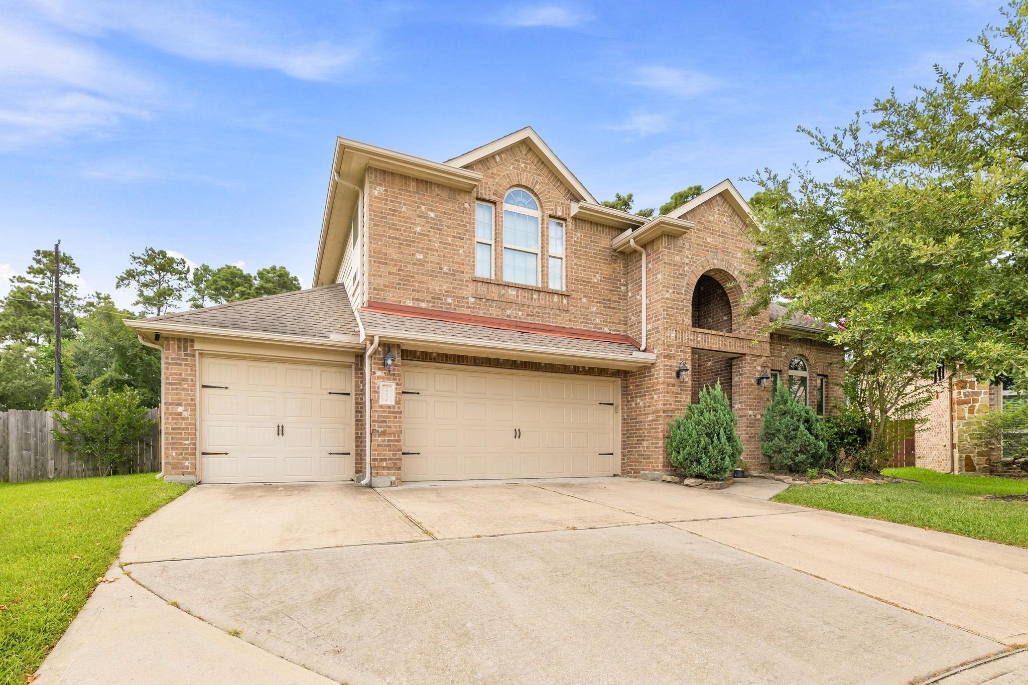 Image 2: Front exterior showcasing the home's attractive br