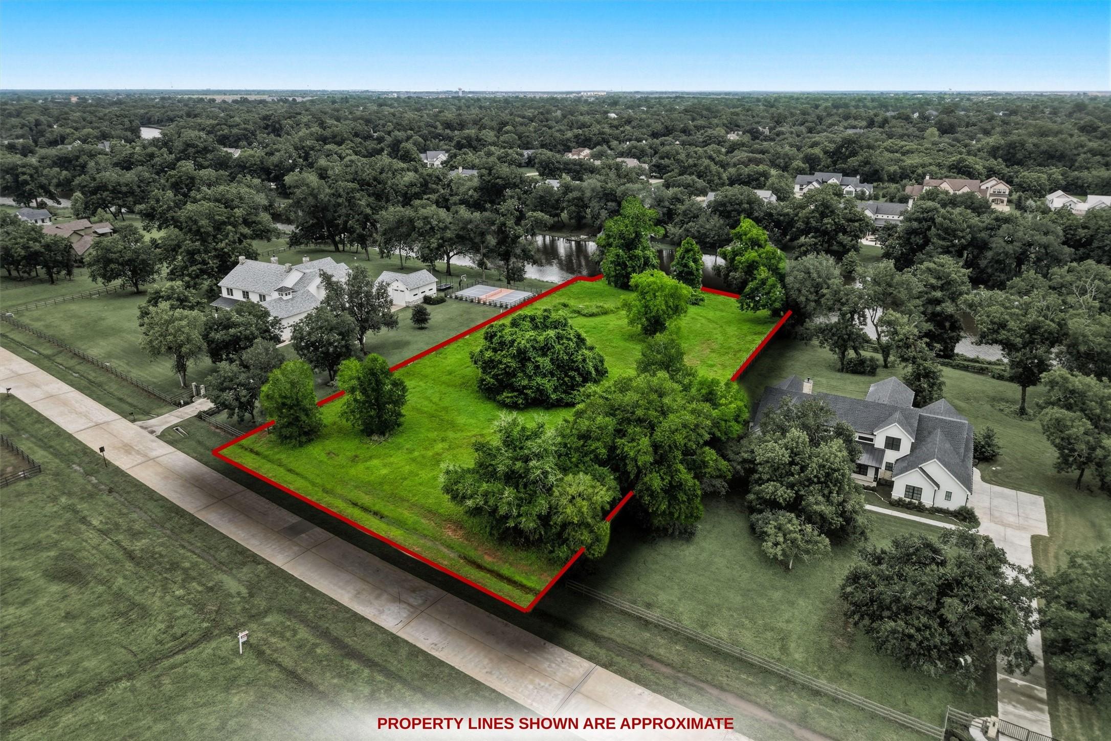 Image 1: Approximate property lines showcase the impressive